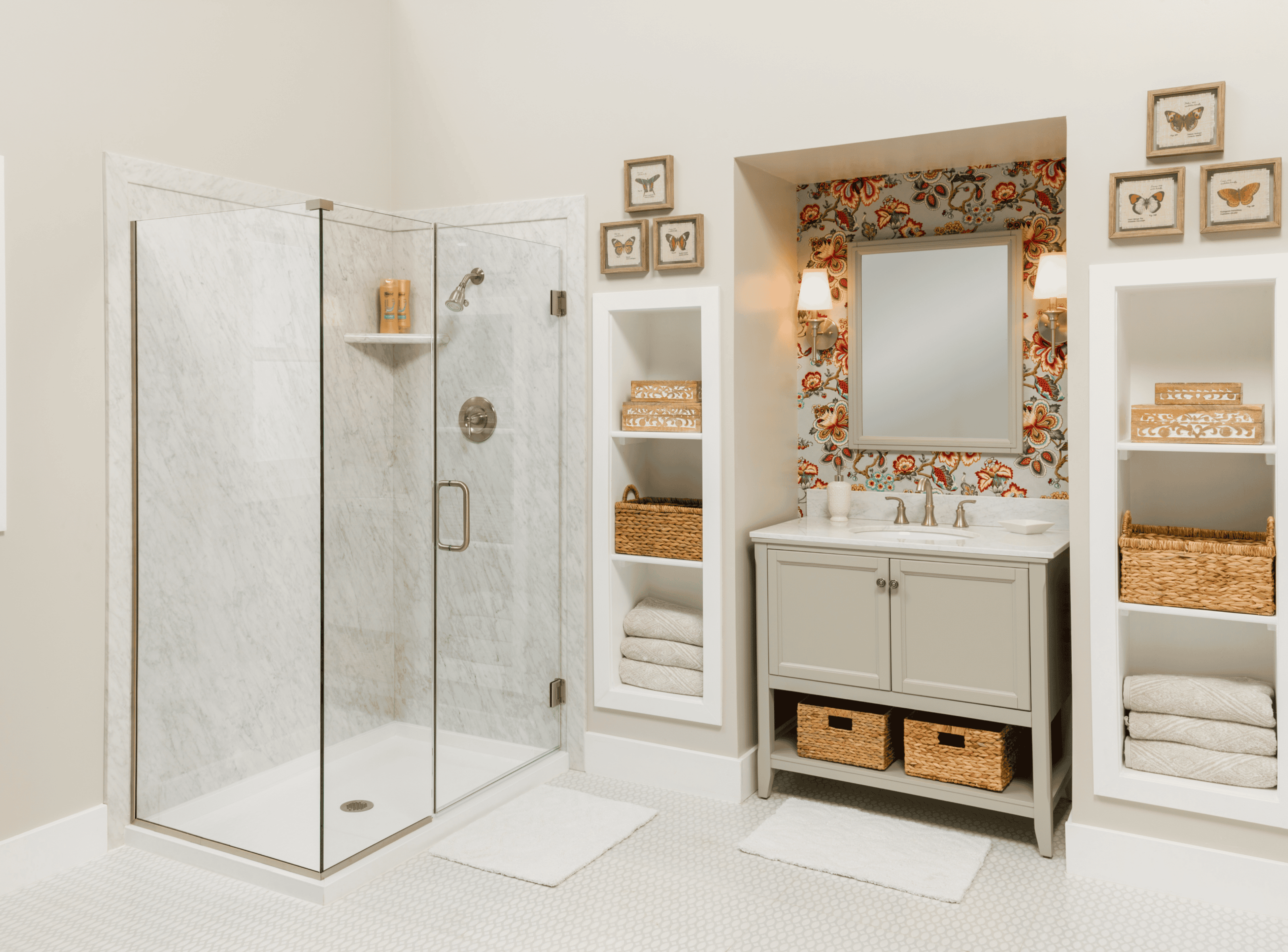 Elegant bathroom with walk-in shower, vanity, and decorative wall art for a modern, cozy look.