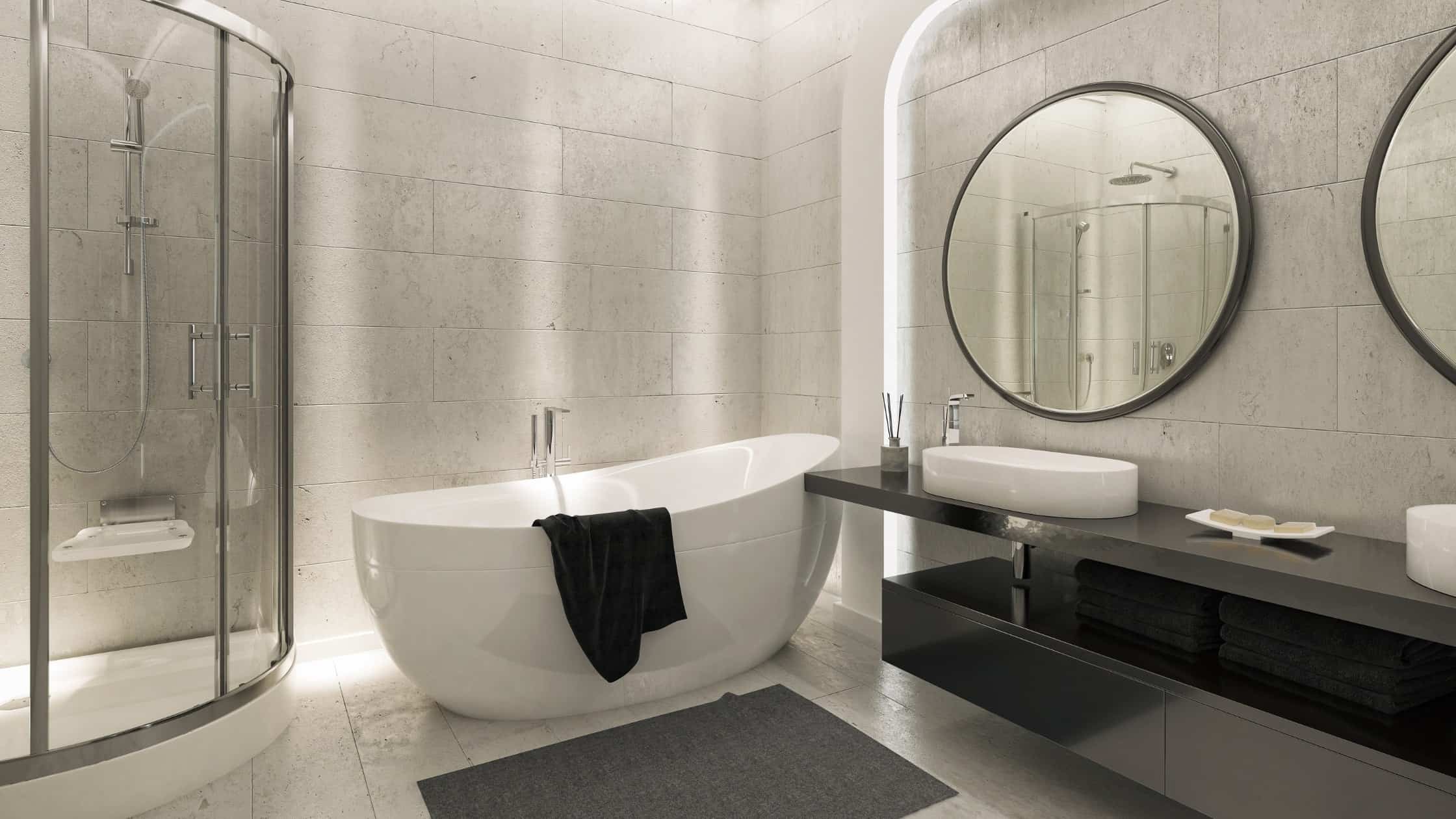 Elegant modern bathroom with bathtub and shower enclosure, minimalist decor.