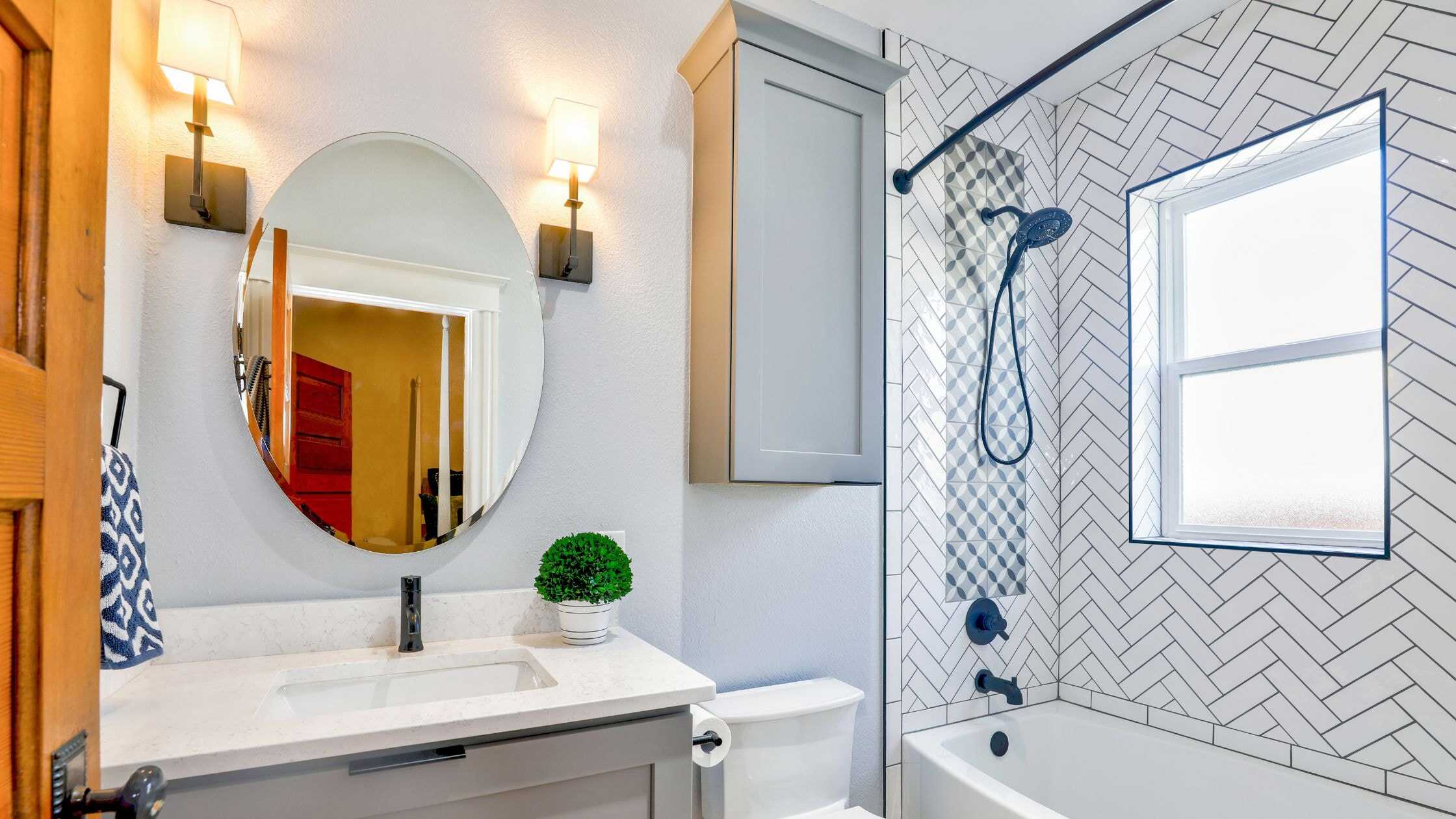 Elegant bathroom with a walk-in shower, stylish tiles, and contemporary fixtures. Perfect for a luxu.