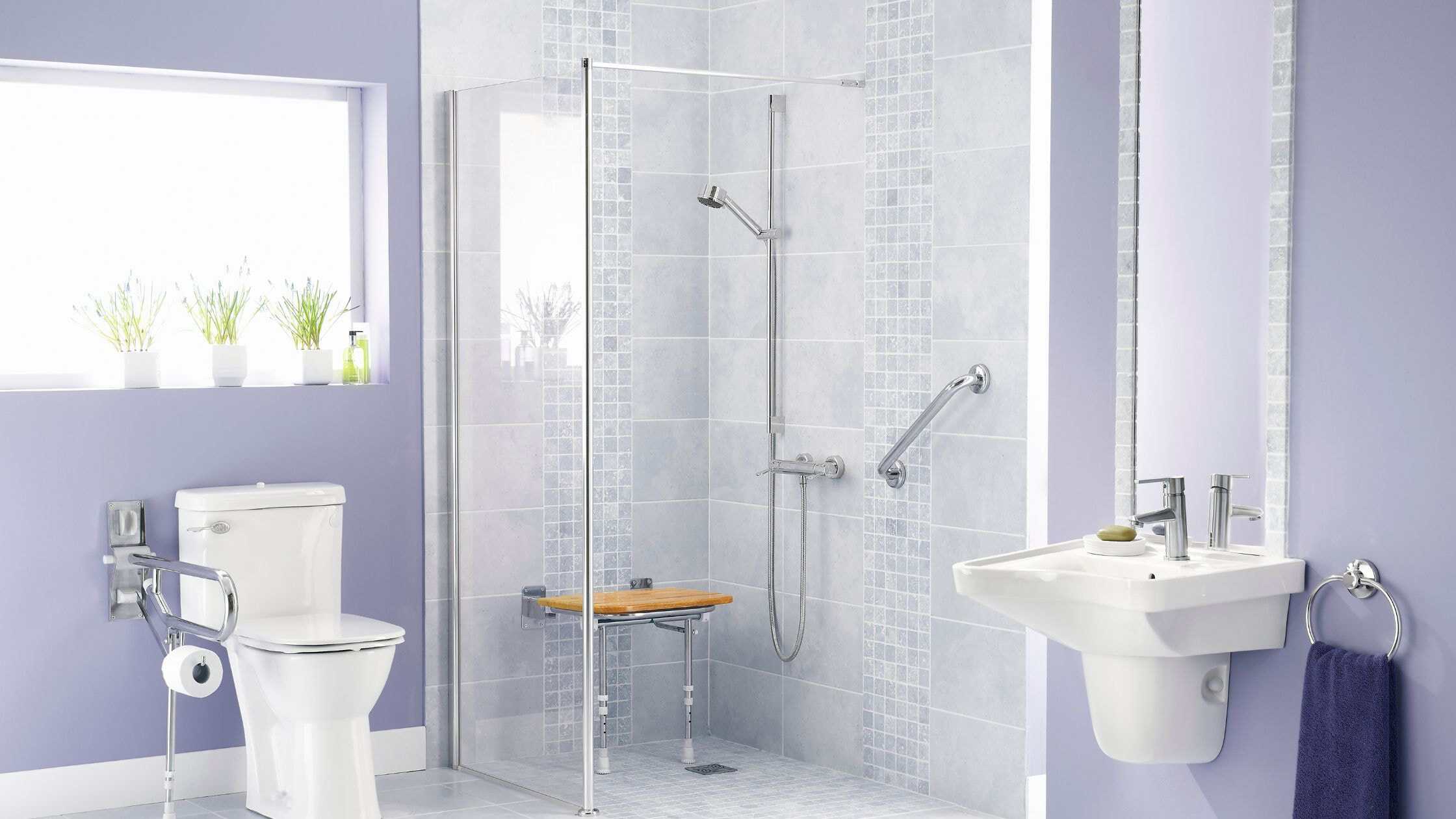 Modern bathroom with walk-in shower and sleek fixtures.