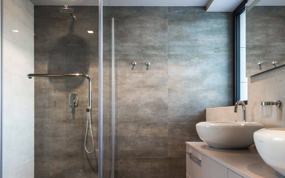 Contemporary bathroom with walk-in shower and sleek design elements.