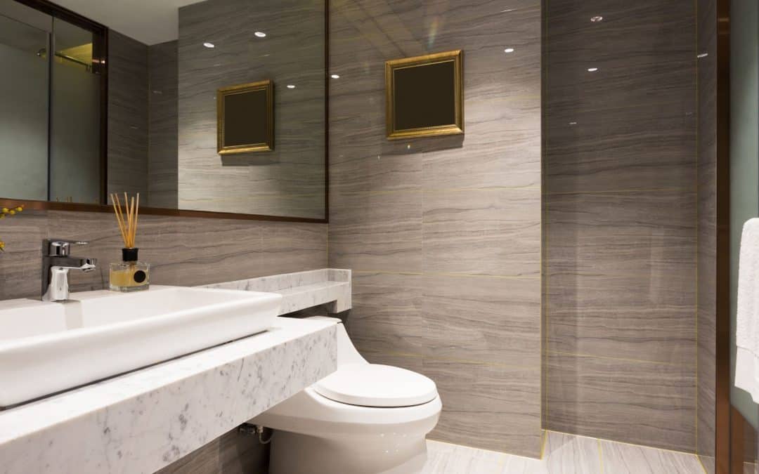 Modern bathroom featuring a sleek marble sink and contemporary decor.