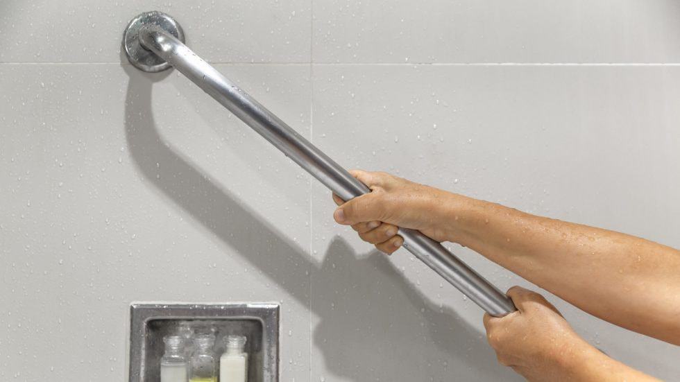 Durable stainless steel shower grab bar for safety and support.